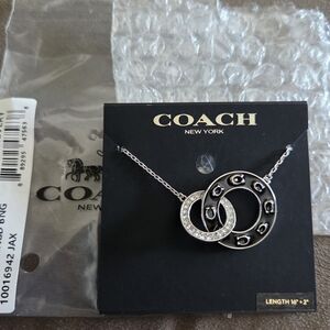 COACH Silver Interlocking Circle Pendant Necklace with Crystal Accent